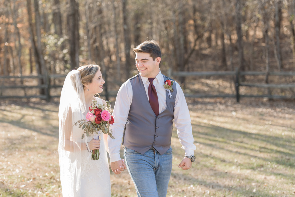 bride groom walking through forrest