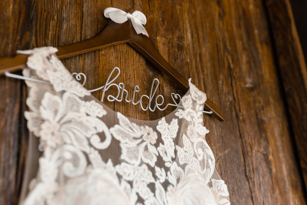 wedding gown on bride hanger