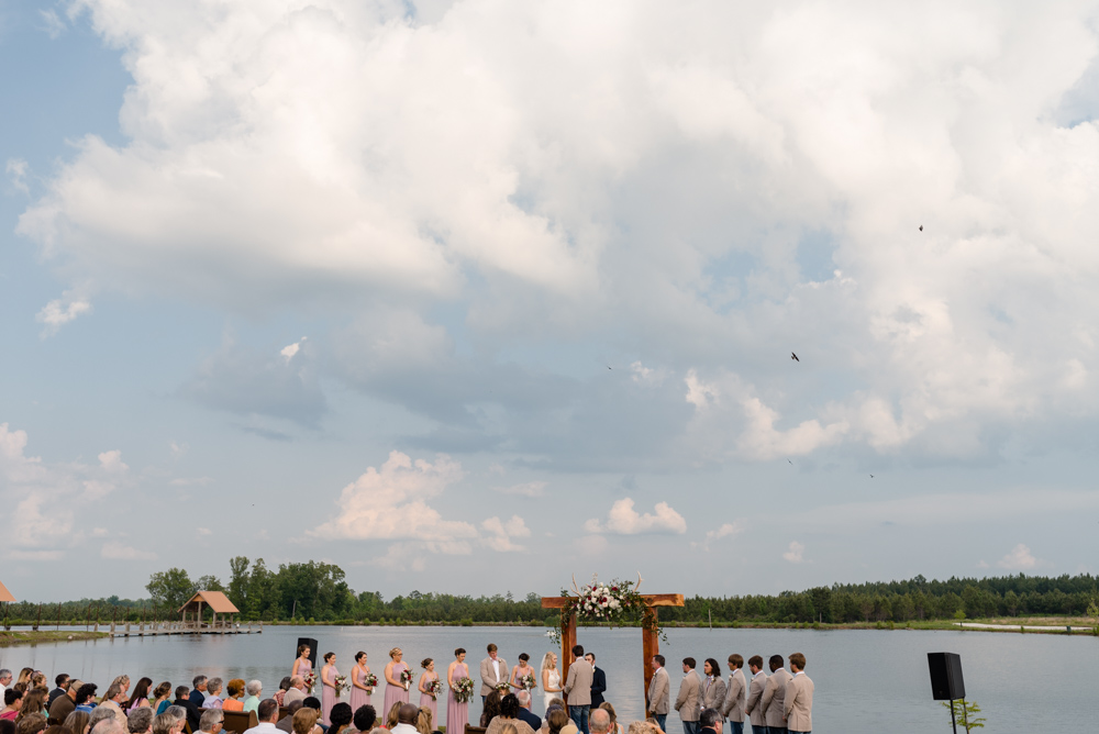 exchanging vows on lake