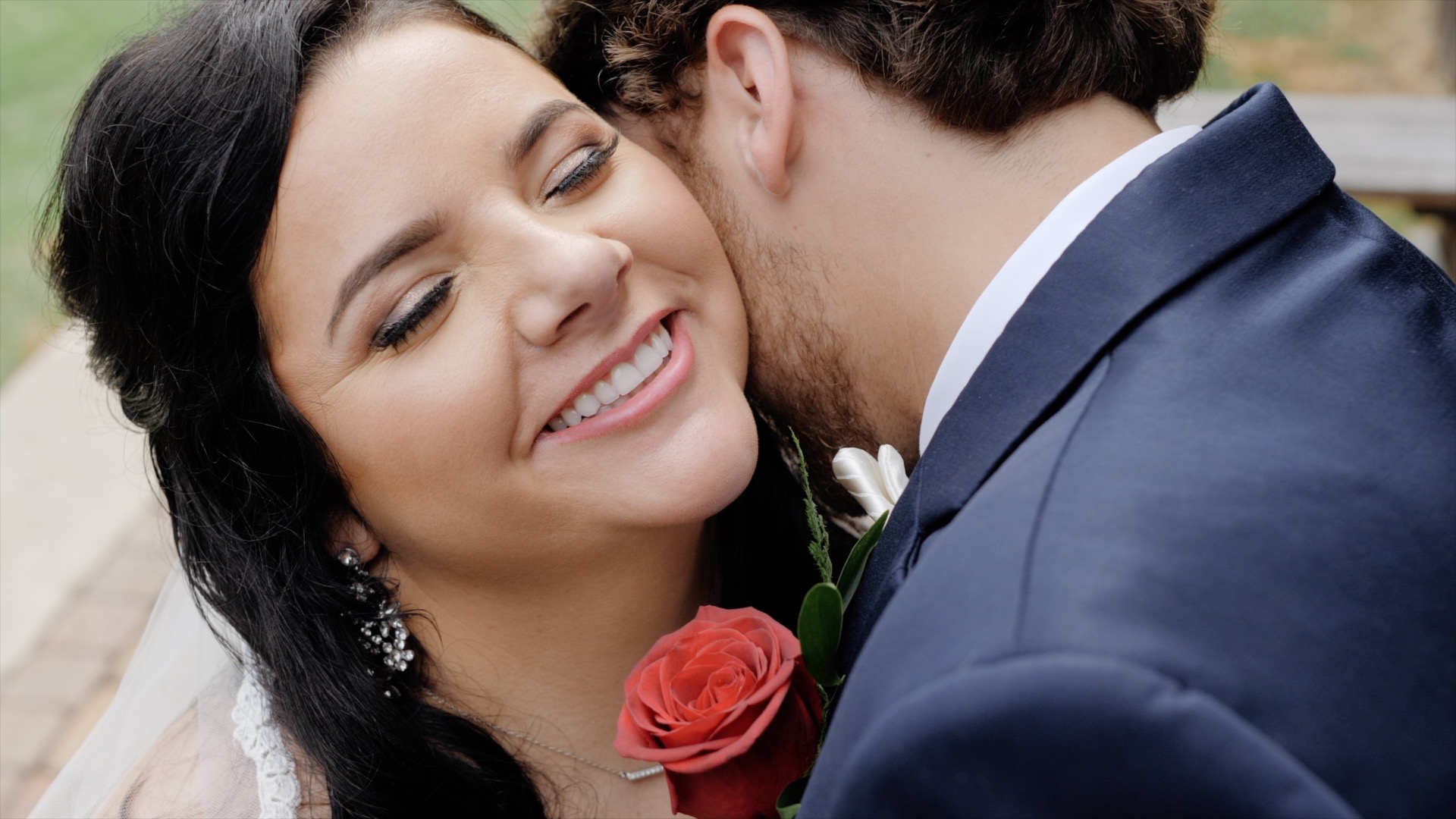 bride groom kissing at wedding in mobile