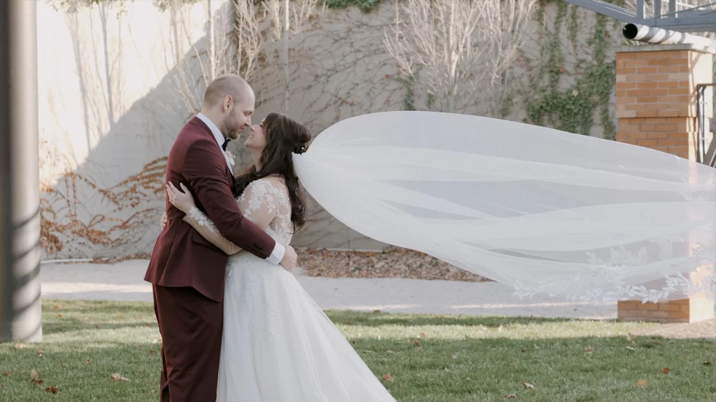 veil toss bridal couple portraits